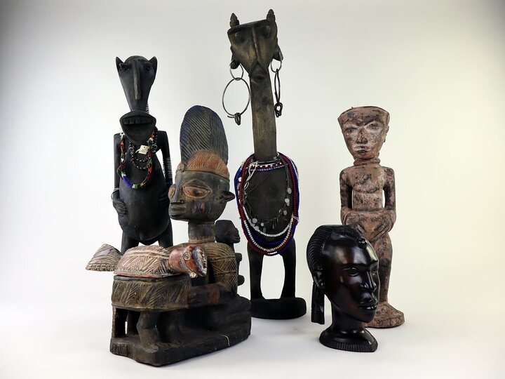 A collection of statues and objects donated to Anthropology by Luella Buros.