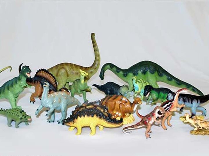 A display of different plastic dinosaurs